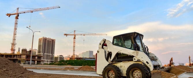 Heavy machinery performing dynamic compaction on a municipal solid waste site to enhance ground stability and reduce long-term settlement risks.